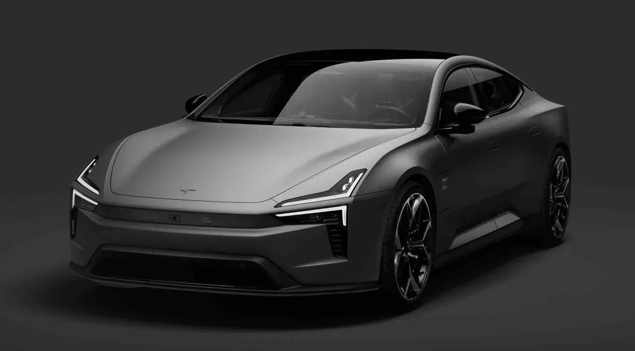 Polestar auto grigia, con fari a LED distintivi e cerchi in lega sportivi, su sfondo scuro.