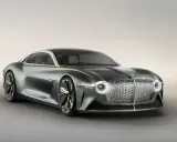 Concept car Bentley elettrica, un futuro di lusso e sostenibilità. Design futuristico con griglia iconica e fari a LED.