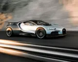 Bugatti Tourbillon sfreccia su una strada, con scie luminose che ne accentuano la velocità.