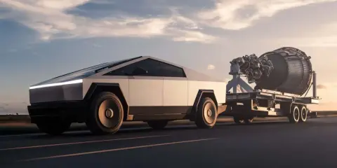 Cybertruck traino un motore di razzo, dimostrando la sua incredibile capacità di traino e il suo peso.