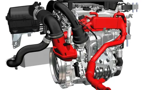 Motore Mercedes Classe A con turbocompressore e sistema di raffreddamento rossi.
