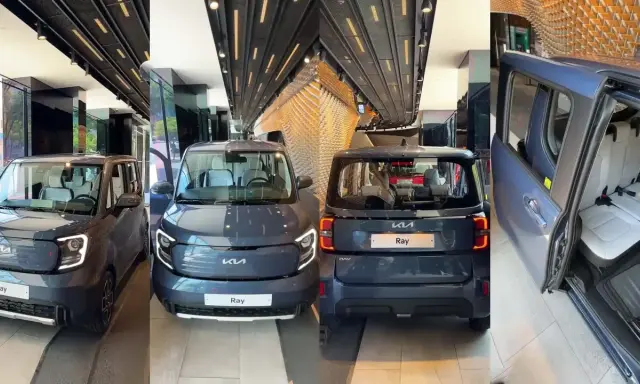 Tre Kia Ray, un'auto elettrica compatta, esposte in un salone moderno. La Kia Ray è pronta per il futuro.