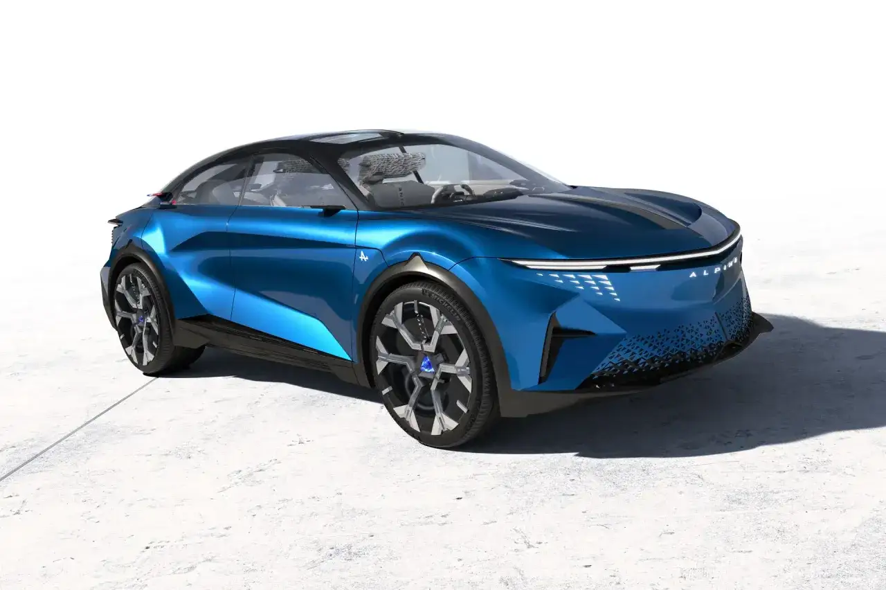 Concept car Alpine A390 blu elettrico, con linee futuristiche e un design sportivo.