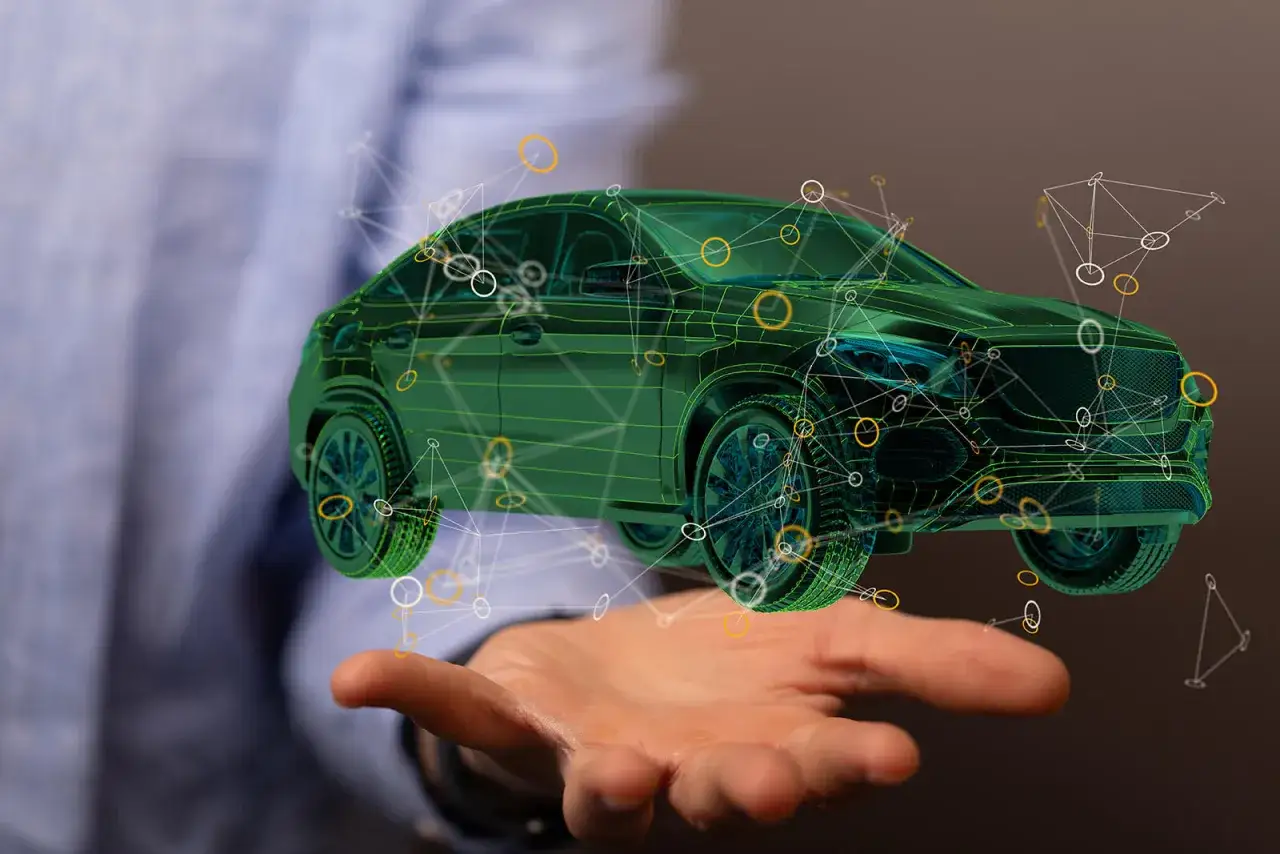Un'auto verde digitale fluttua sopra una mano, con una rete di punti e linee che ne definisce il automotive significato.