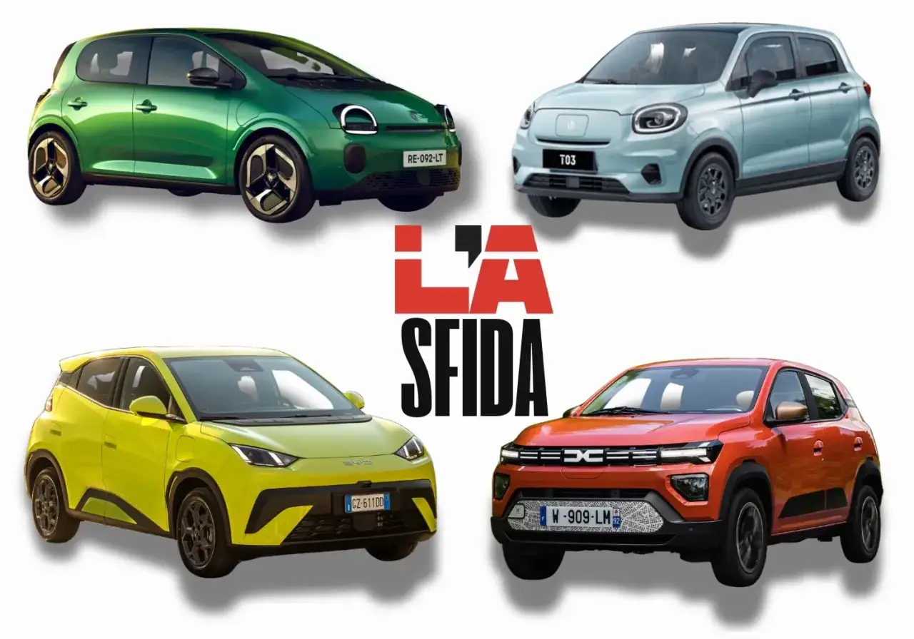 Quattro piccole auto elettriche, una verde, una azzurra, una gialla e una arancione, pronte per la sfida.