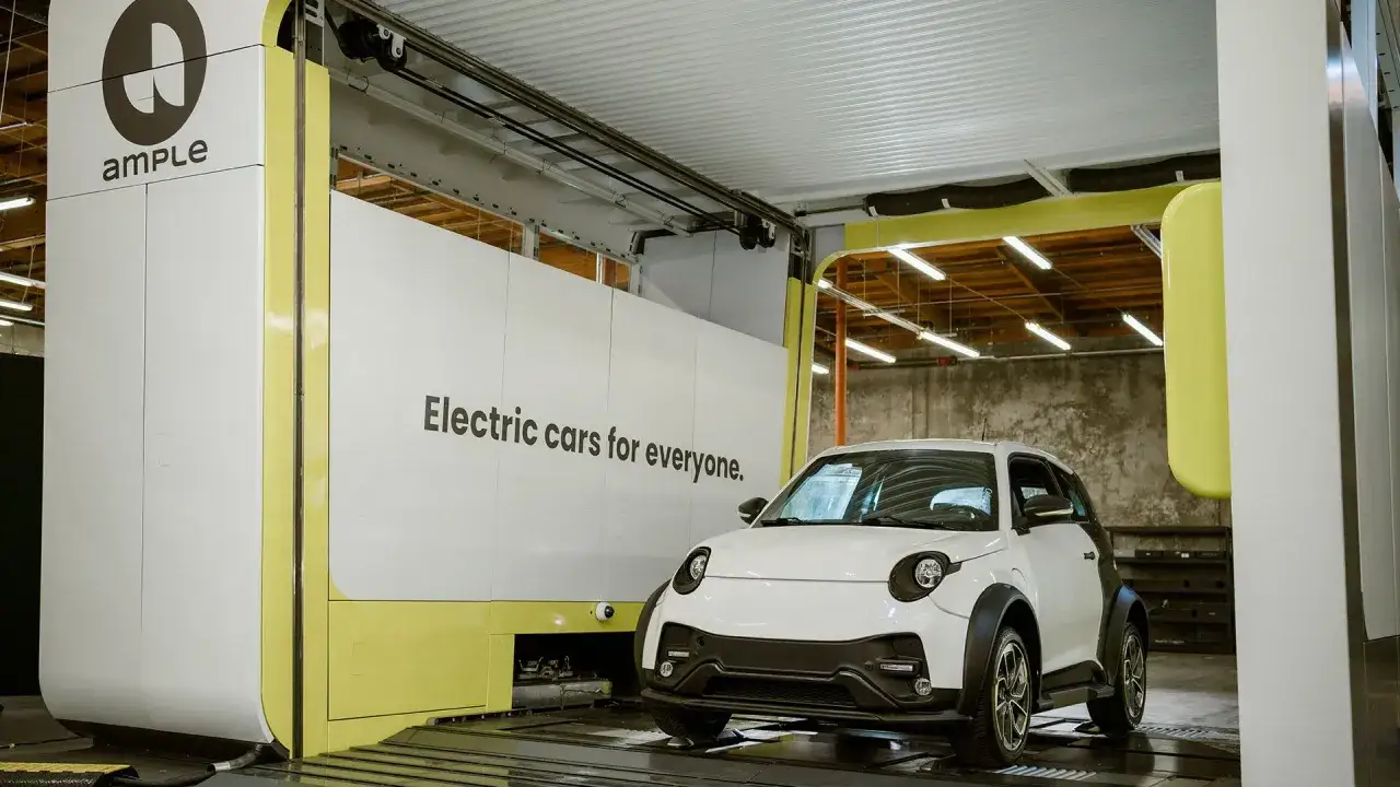 Stazione di battery swap Ample con un'auto elettrica bianca pronta per il cambio rapido.